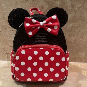 Loungefly Mini Mouse Disney Park Sequence in red and Black with Polkadots.
